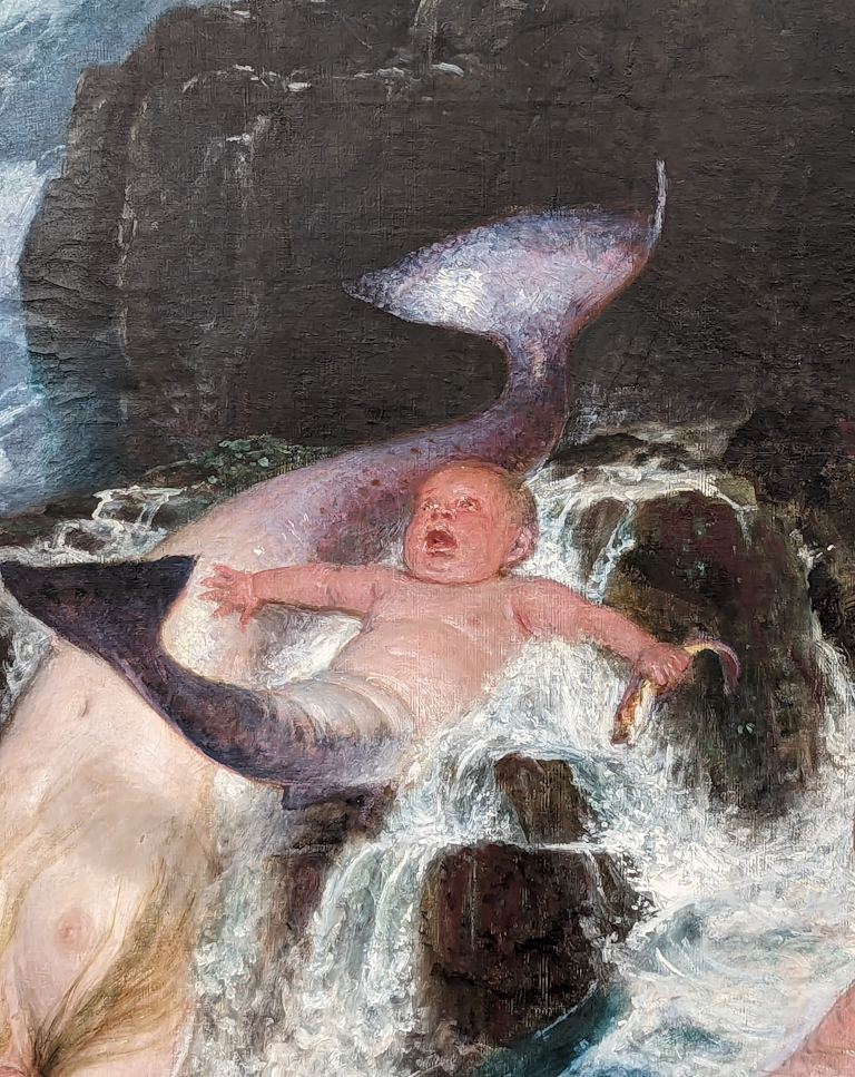 A cute baby merman